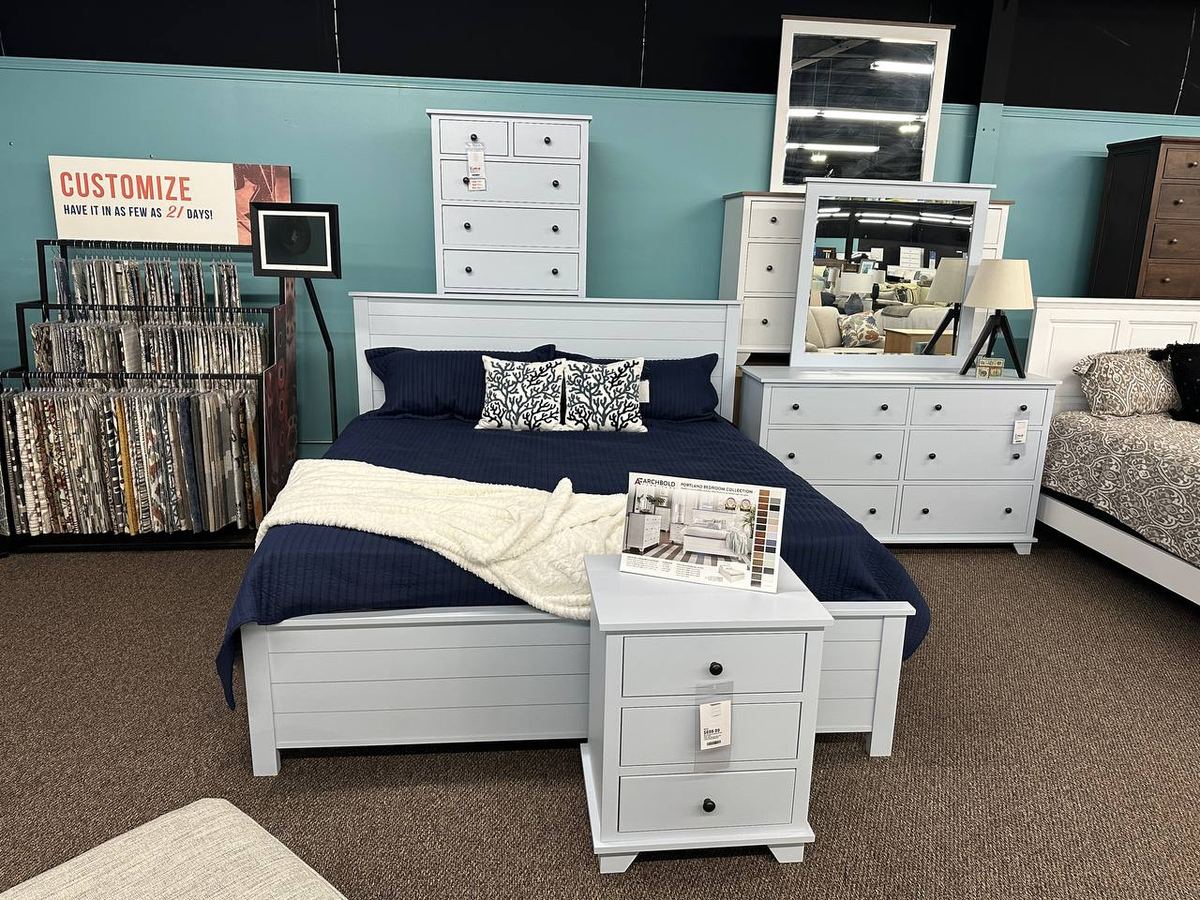 Archbold Portland Bedroom Collection in the Bayside Blue finish on the Newport showroom floor