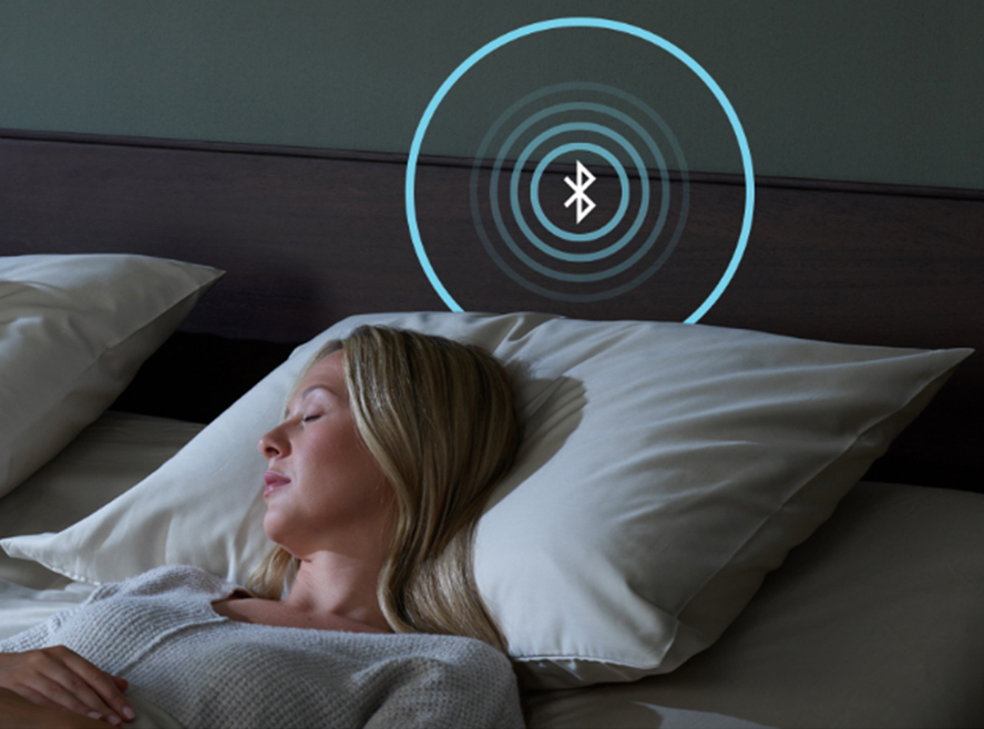 Person settling into bed